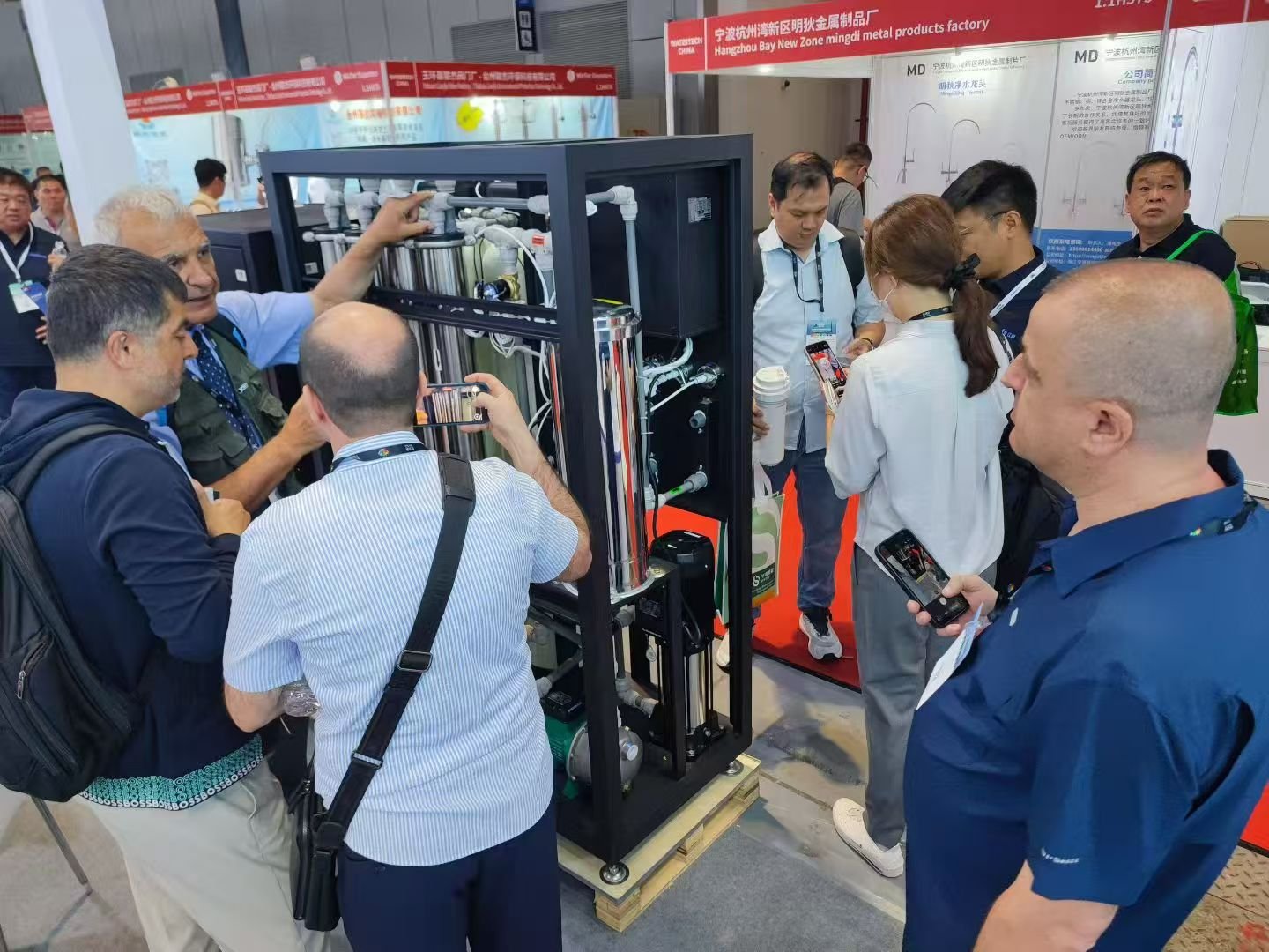 Jeefy team discussing OEM RO water purifier solutions with international buyers